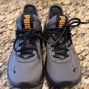 Puma Charcoal Sneakers with Vibrant Orange Details